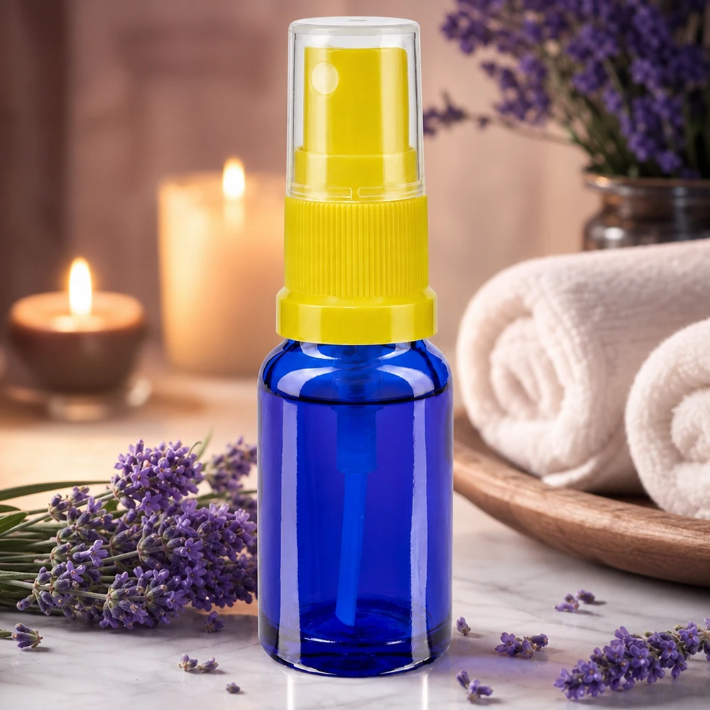 Nachfüllbare 30ml Zerstäuberflasche aus blauem Apothekenglas mit gelbem Pumpzerstäuber