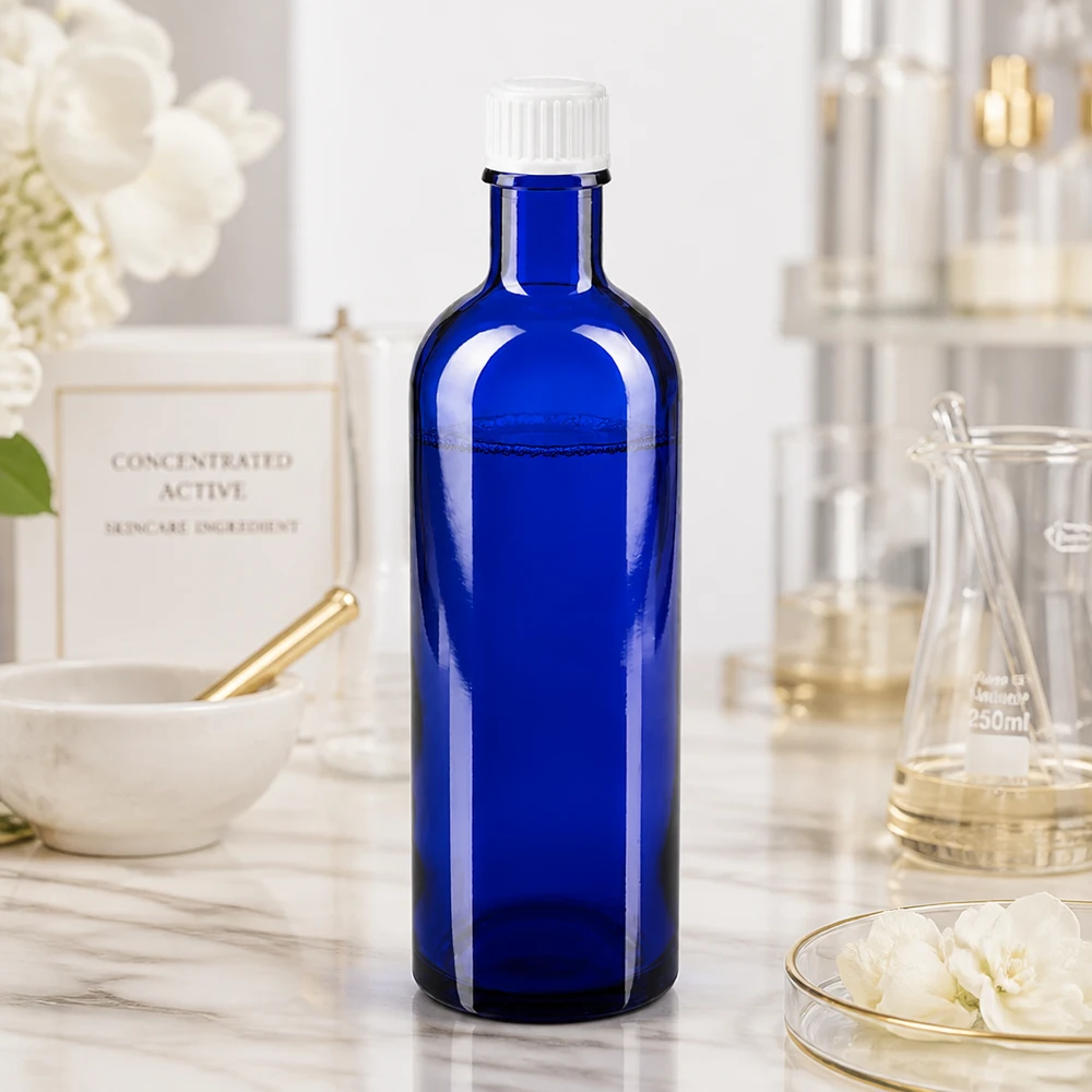 Apothekenflasche blau 200ml Schraubverschluss weiß Standard Rechteckige blaue Glasflasche 200ml mit geriffeltem weißem Schraubverschluss für Kosmetik