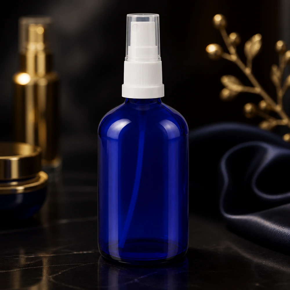 Runde blaue Apothekerflasche 100ml mit STD Pumpzerstäuber in Weiß für Seren und Tonika