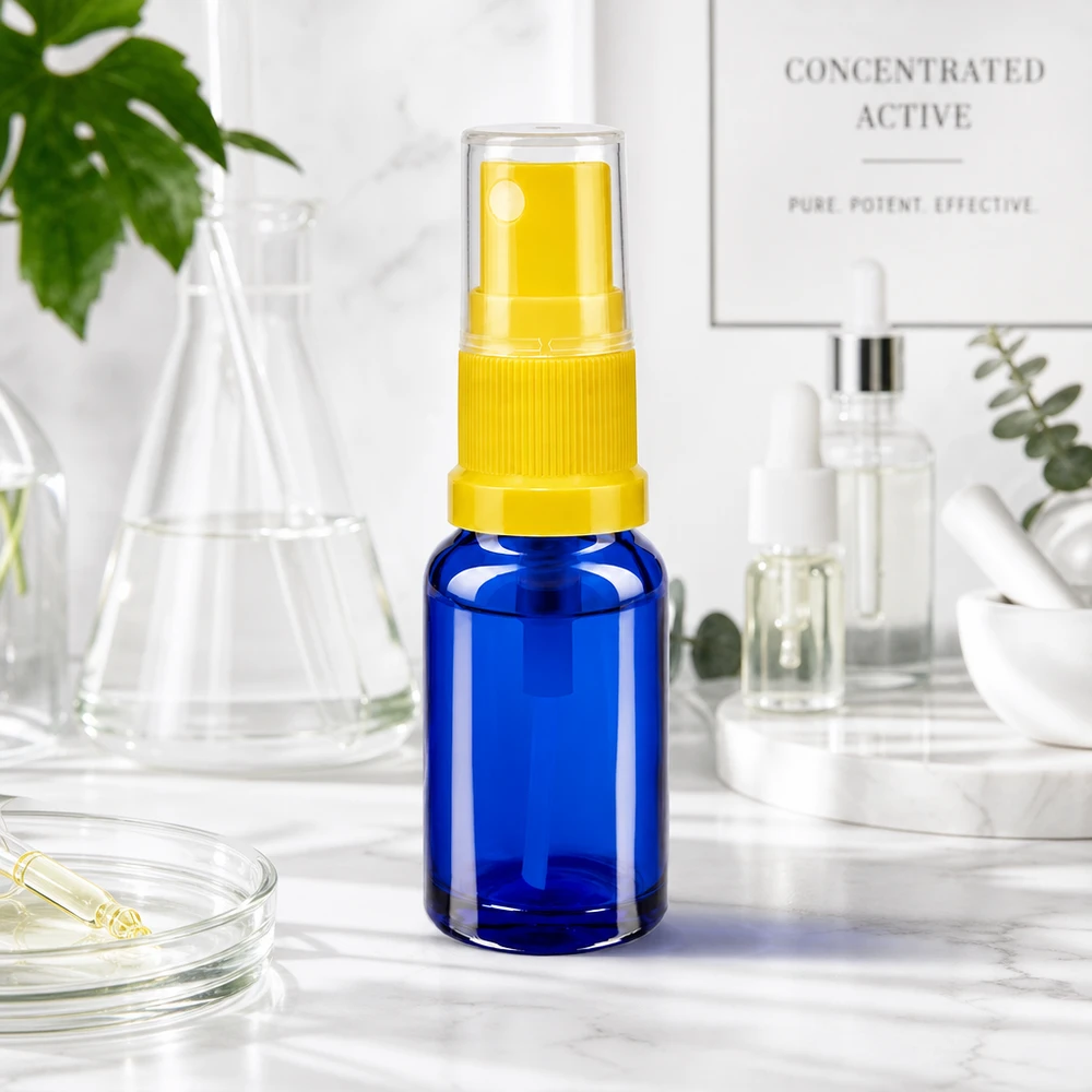Apothekenflasche blau 10ml Sprayaufsatz gelb Apotheker Sprühflasche 10ml in Kobaltblau mit gelbem Zerstäuber für Kosmetik und Pharmazie