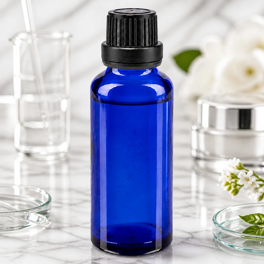 Kleine blaue Glasflasche 30ml mit OV Verschluss schwarz für Serum und Kosmetikprodukte