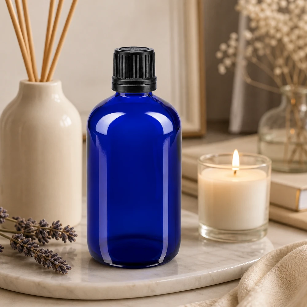Apothekenflasche blau 100ml Schraubverschluss schwarz Giessring Originalitätsverschluss Kleine blaue 100ml Apothekerflasche aus Borosilikatglas mit geripptem Schraubverschluss