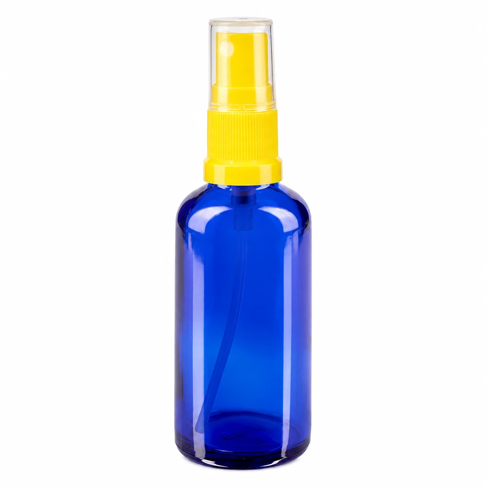 Apothekenflasche blau 50ml Sprayaufsatz gelb Blaue Apotheken-Sprayflasche 50ml aus Glas mit transparenter Schutzkappe