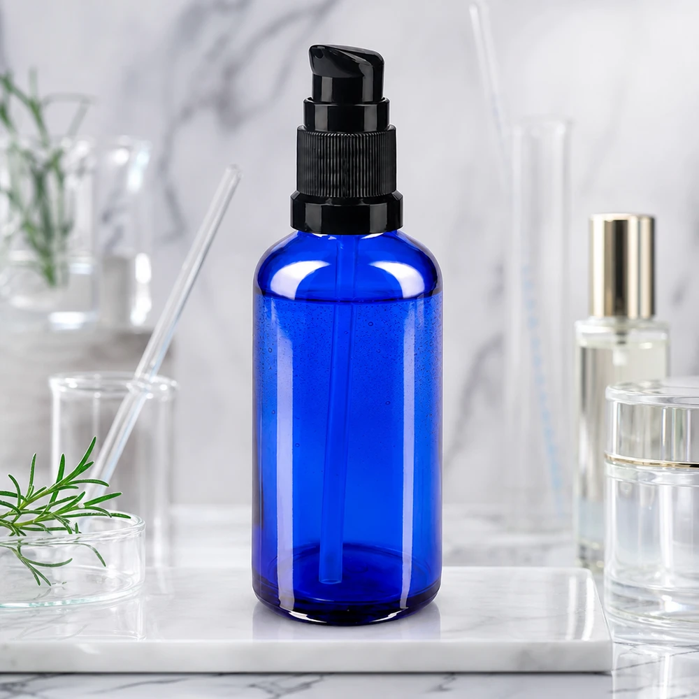 Apothekenflasche blau 50ml PumpVerschluss schwarz Standard Kleine blaue Rundglasflasche 50ml mit Druckpumpe für Kosmetik und Pharmazeutika