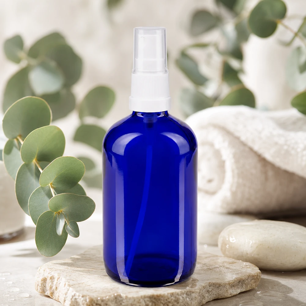 Blaue Apothekerglas Sprayflasche 100ml mit feinem Sprühnebel für Gesichtswasser und Tonikum