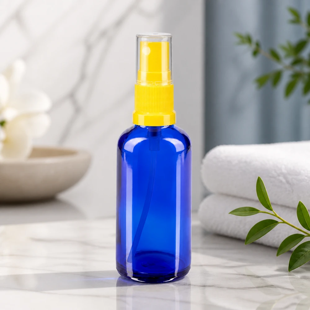 Apothekenflasche blau 50ml Sprayaufsatz gelb Kobaltblaue Sprayflasche 50ml STD mit transparenter Schutzkappe und gelbem Pumpkopf