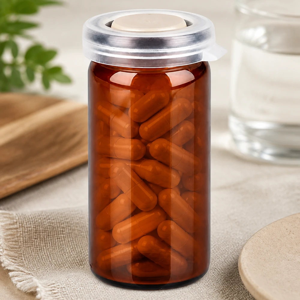 Tabletten/Rollrandglas 10ml braun mit Schnappdeckel Kompaktes Medizinfläschchen 10ml mit transparentem Klappdeckel und Kapselinhalt