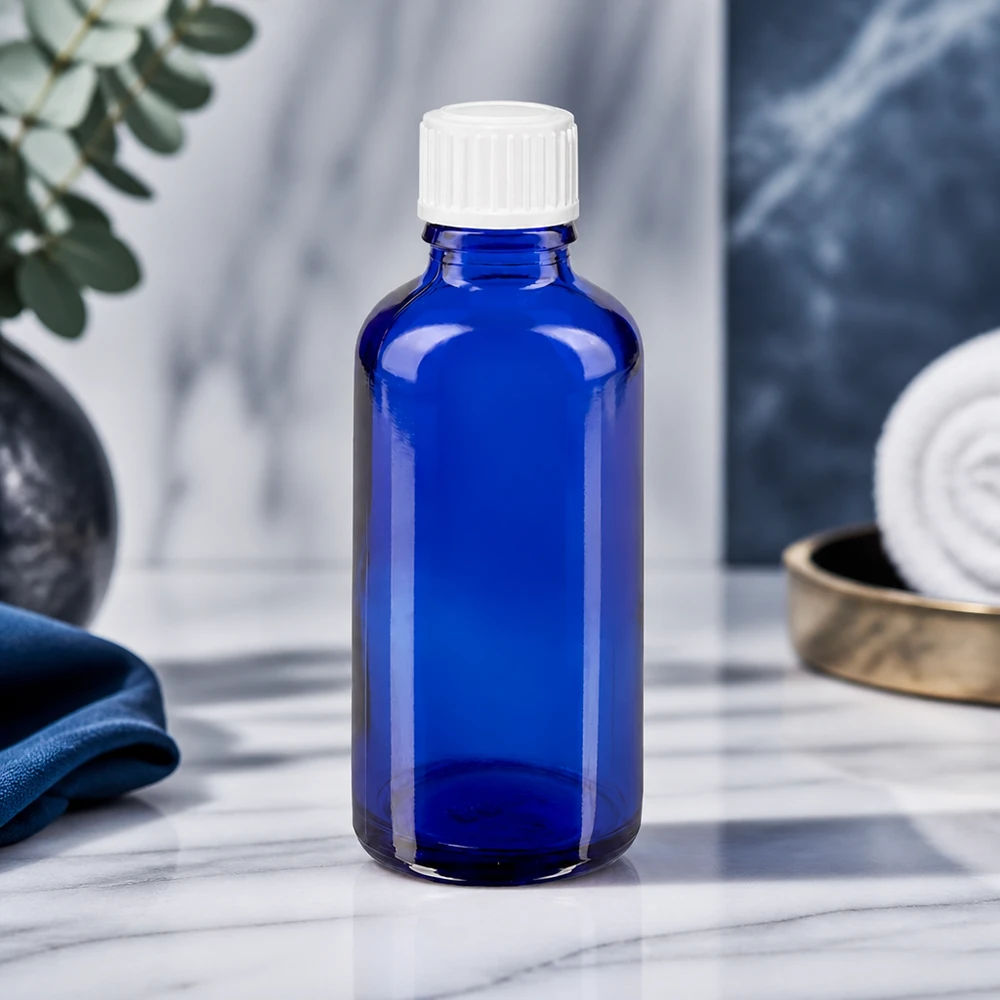 Blaue Apothekerflasche 50ml mit 0.9mm Tropfeinsatz und kindersicherem weißem Schraubdeckel