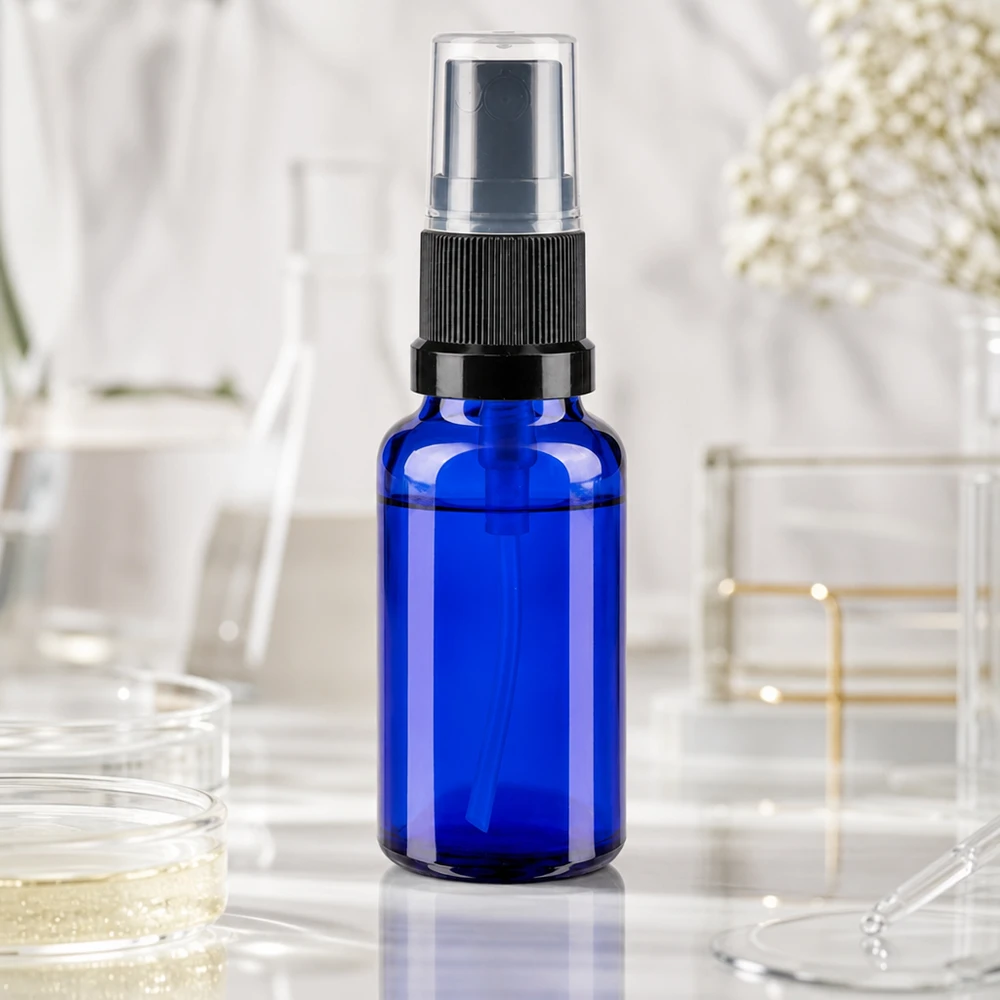Hochwertige 20ml Sprühflasche aus kobaltblauem Glas mit schwarzer Pumpkappe