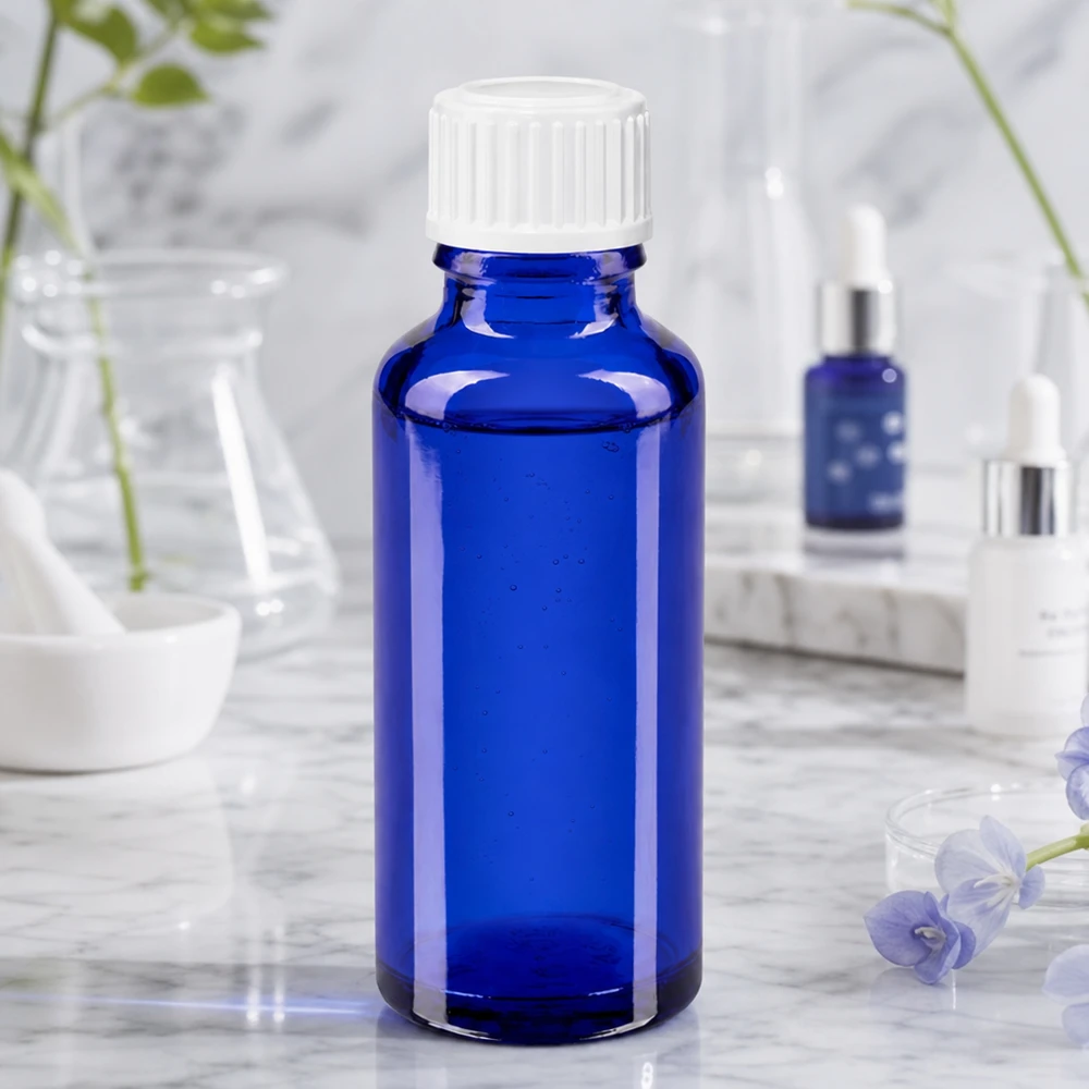 Apothekenflasche blau 30ml Schraubverschluss weiß Globuli Standard Blaue Standardflasche 30ml Apothekerglas mit 3mm Tropföffnung zwischen Laborutensilien