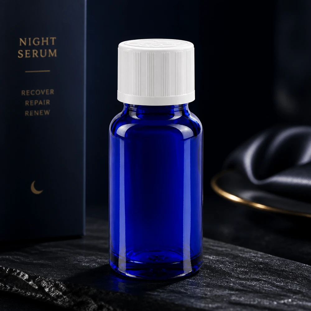 Apothekenflasche blau 10ml Schraubverschluss weiß Kindersicherung Standard Kobaltblaue Glasflasche 10ml mit weißem Sicherheitsverschluss auf dunklem Schieferstein