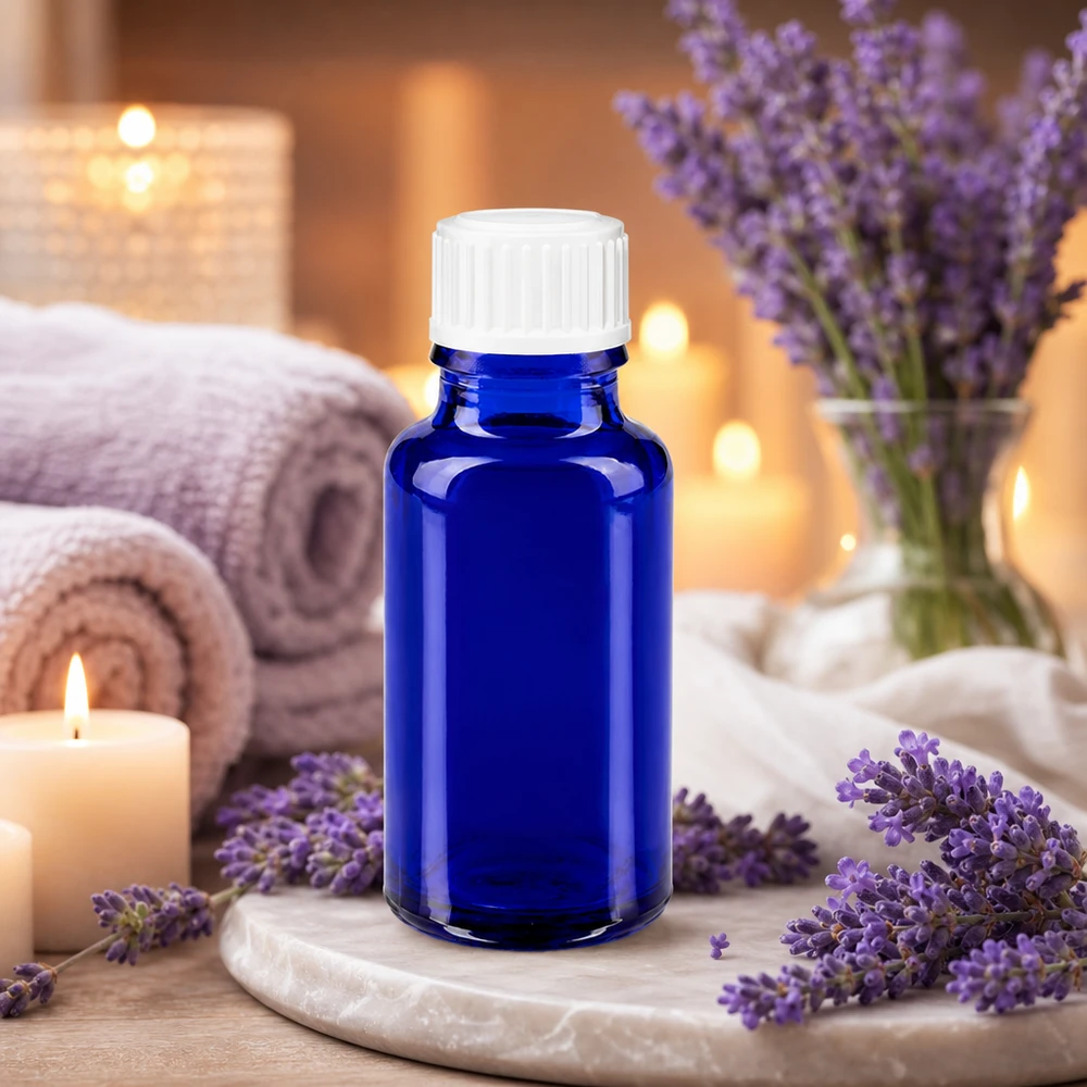 Apothekenflasche blau 20ml Schraubverschluss weiß Standard Kleine blaue Apothekerflasche 20ml mit Originalitätsverschluss weiß auf Marmor