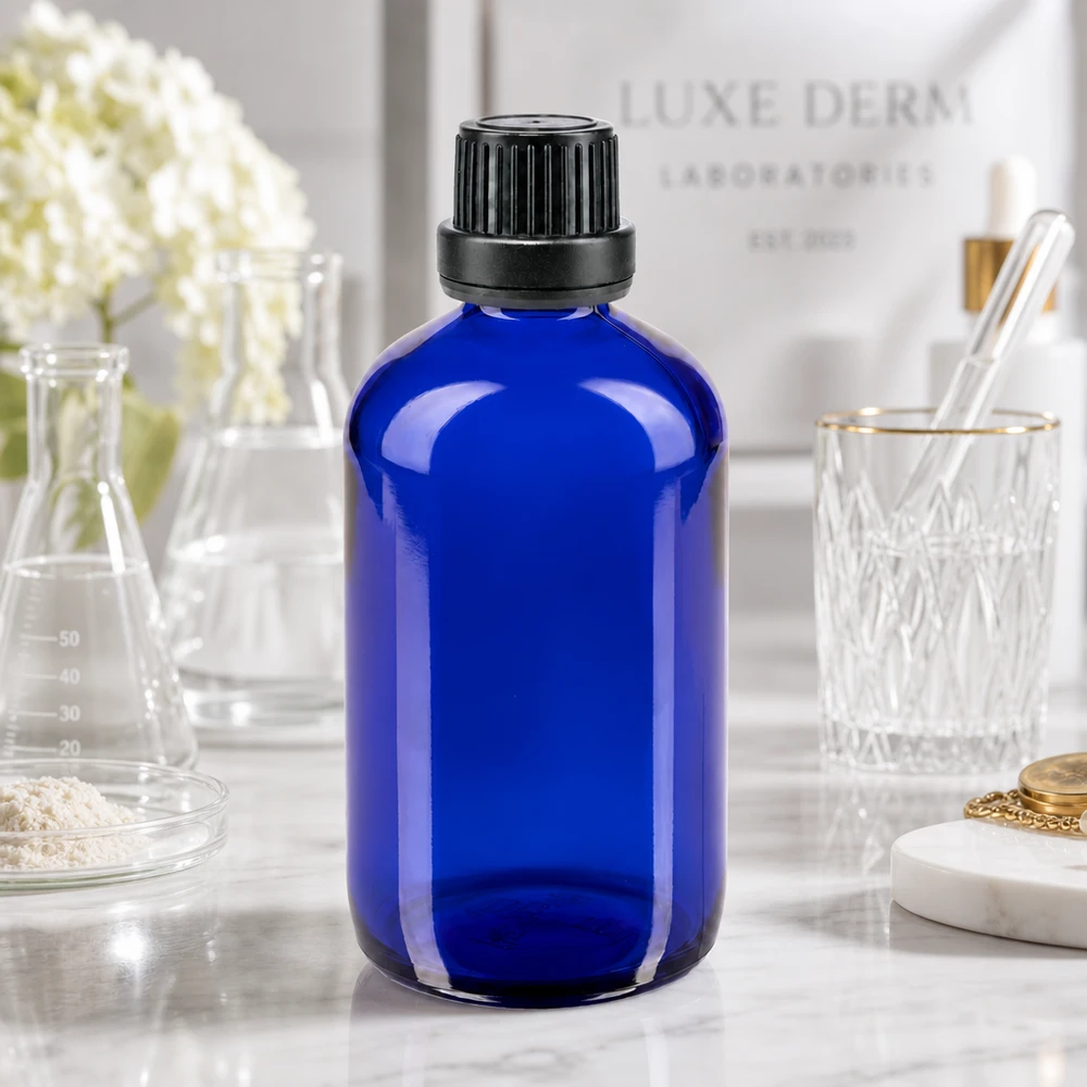 Apothekenflasche blau 100ml Schraubverschluss schwarz Dichteinlage Originalitätsverschluss Kobaltblaue 100ml Apothekerflasche aus UV-Schutzglas mit geripptem Schraubverschluss 11mm