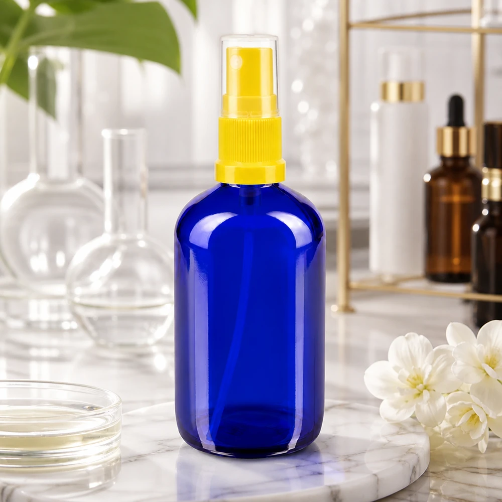 Apothekenflasche blau 100ml Sprayaufsatz gelb Kleine Sprayflasche 100ml in Blau mit gelb-transparentem Zerstäuber für ätherische Öle
